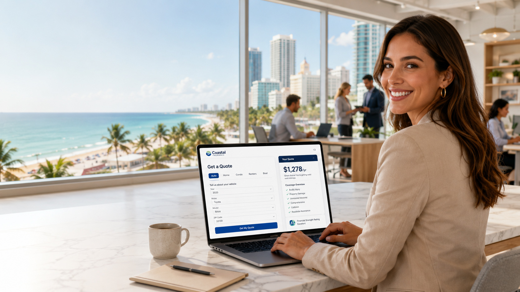 Smiling woman using a laptop with an insurance quote calculator in a modern office overlooking Miami Beach, with coworkers in the background